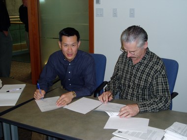 Ray fung and tim pringle signing mou